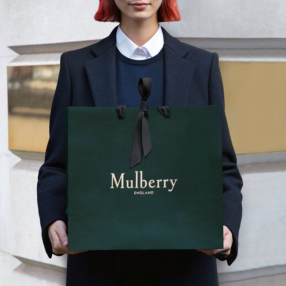 model holding mulberry gift bag